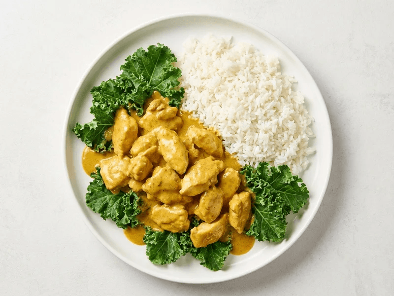 PUMPED - Coconut Butter Chicken — 43g protein chef-made ready meal delivered by Foober
