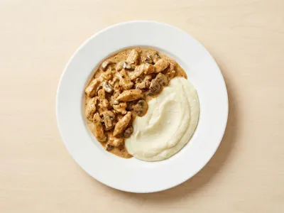 PUMPED - Stroganoff Chicken With Cauli Mash — 49g protein chef-made ready meal delivered by Foober