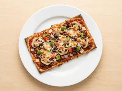 Supreme Loaded Pizza with Low Carb Keto Base — 29g protein chef-made ready meal delivered by Foober