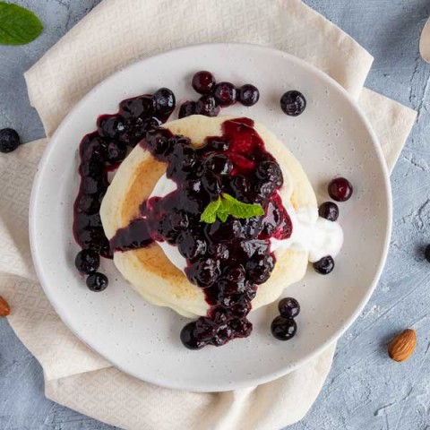 Blueberry Protein Pancakes with Coconut Cream